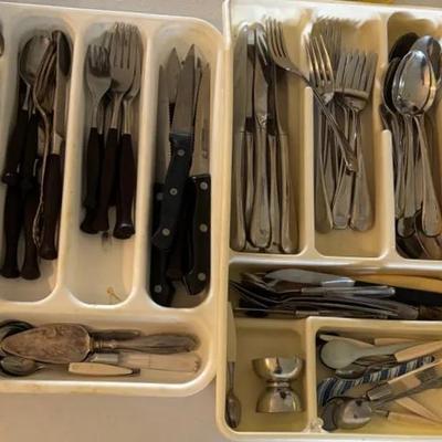 Large Mixed Lot of Assorted Flatware, Serving Utensils, and Knives