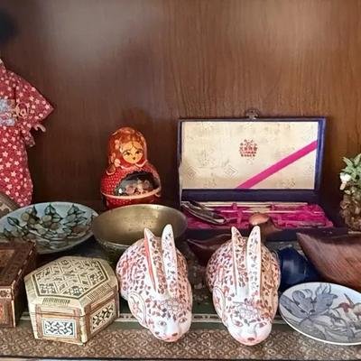 Asian Decorative Collectibles Lot Including Russian Matryoshka, Porcelain Rabbits, and Carved Duck