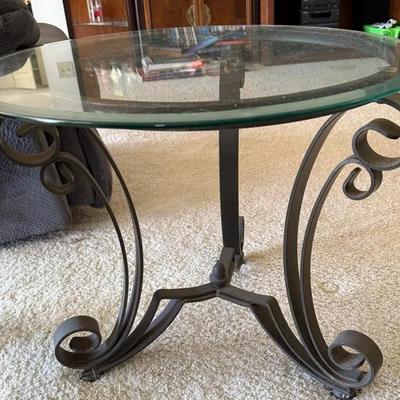 Oval Glass Top Table with Decorative Wrought Iron Base