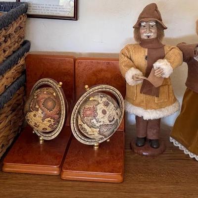 Home Decor Assortment with Wicker Baskets, Globe Bookends, and Holiday Caroler Figurines