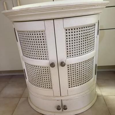 White Curved Front Cabinet with Woven Cane Panel Doors