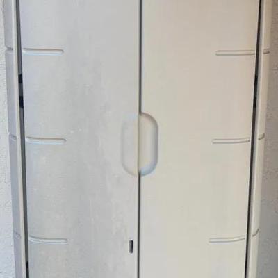 Rubbermaid Outdoor Vertical Storage Cabinet with Assorted Garden Supplies and Decor