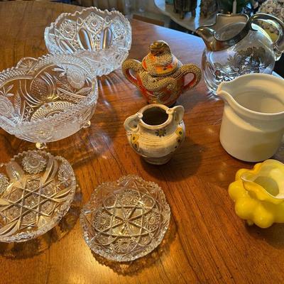 Mixed Glass and Ceramic Serving Pieces Including Cut Crystal Bowls, Pitchers, and Hand-Painted Potte