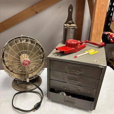 GE Heater, Metal Cabinet With Dividers, Hydraulic Fire Hose Clamp, Spice Grinder And Thermometer