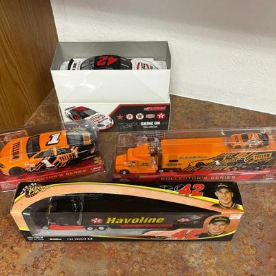 New In Box 2003 & 2005 Jamie McMurray 1:24 Die-Cast Replica Cars & Two 1:64 Trailer Rigs