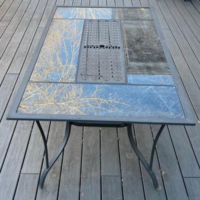 Metal Outdoor Patio Table With Faux Stone Glass Top Panels And Umbrella Slot
