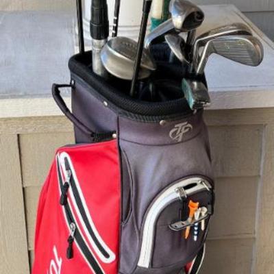 Top Flite Golf Bag With Assorted Atomsgolf Clubs, Assorted Balls, And Tees
