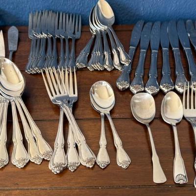 Set Of Oneida Stainless Steel Silverware - 12 Table Spoons, 12 Teaspoons, 12 Salad Forks, 9 Knives, 6 Forks