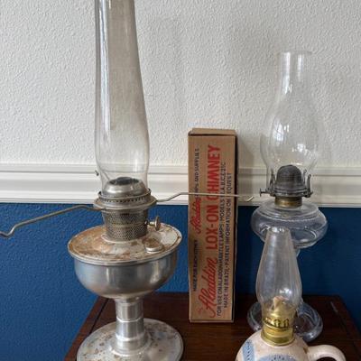 Vintage Aladdin Metal Oil Lamp With Original Box, Glass Oil Lamp, And A Pottery Oil Lamp By South Road