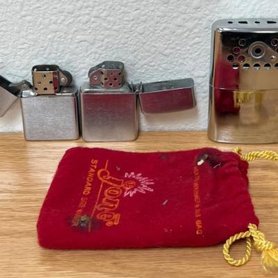 (2) Vintage Lighters - Plain Zippo And Champ Austria Jon-e Standard Size Warmer