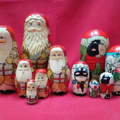 Two Hand-Painted Wooden Nesting Doll Sets