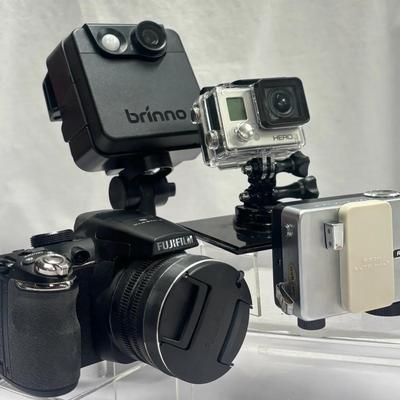 Mixed Camera Collection: GoPro HERO3, Brinno MAC200DN, Fujifilm FinePix, and Ricoh Auto Half