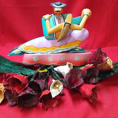 Folk Art Painted Wooden Figure with Decorative Floral Arrangement