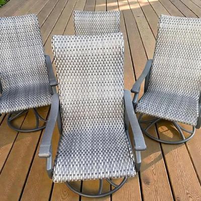 Four patio swivel chairs