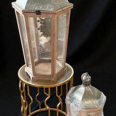 Accent table with a pair of large lanterns