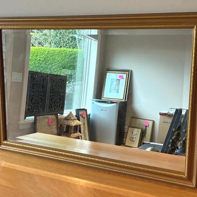 Gold framed beveled mirror