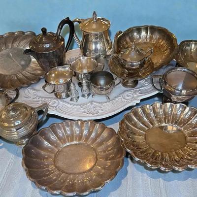 Random silver plate a large ceramic tray