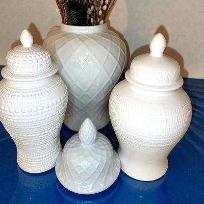 White ceramic lidded jars