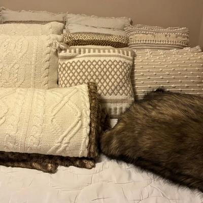 Taupe and cream throw pillows