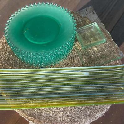 Seven candlewick style green plates