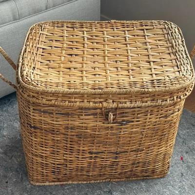 Rattan blanket basket with blankets