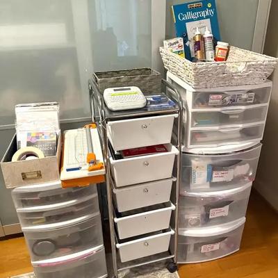 A large collection of office crafting supplies with storage