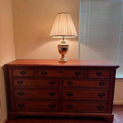 Wood Dresser with Brass like Table Lamp
