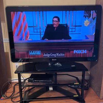 Phillips 50” Flatscreen Tv, Entertainment Center, Magnavox Bluray DVD Player