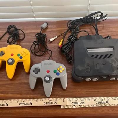 Nintendo 64 w/ Original RCA Plug And Power Cords - No Games, 2 Controllers, Untested
