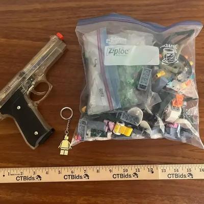 Toy Time! Air Soft Toy Gun & Miscellaneous Bag of Lego Pieces & Gold Lego Man Keychain