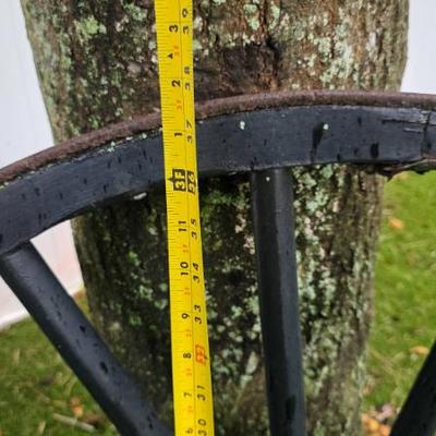 Sale Photo Thumbnail #147: Black Wooden Wagon Wheel with Metal Rim
