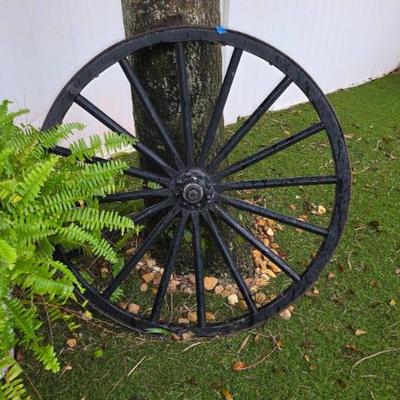 Sale Photo Thumbnail #146: Black Wooden Wagon Wheel with Metal Rim
