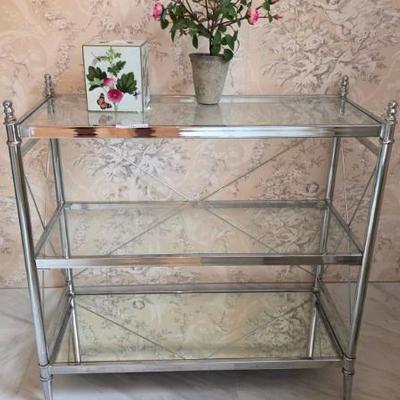 Sale Photo Thumbnail #209: Glass and Chrome Three-Tier Shelf Unit
