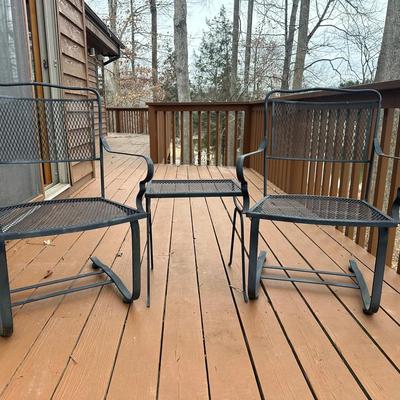 Two Metal Chairs And Side Table