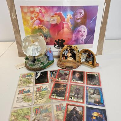 Lot #26 - Disney Collector Lot: Cinderella Snow Globe, Pocohontis Figurine, Trading Cards, Animations Print