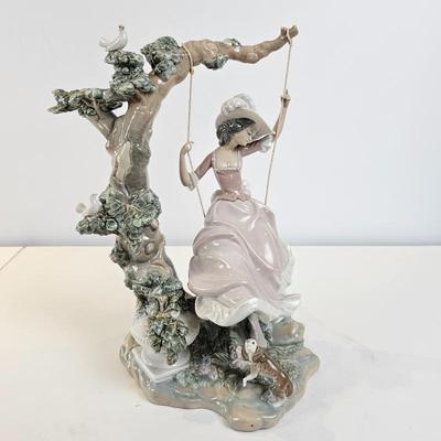 Lot #58 - Vintage Lladro "Victorian Girl on a Swing" porcelain figurine. 