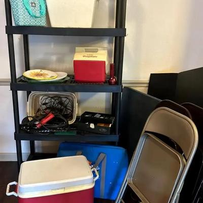 Plastic Storage Shelf with Coolers, Tools, Folding Table & Three Chairs