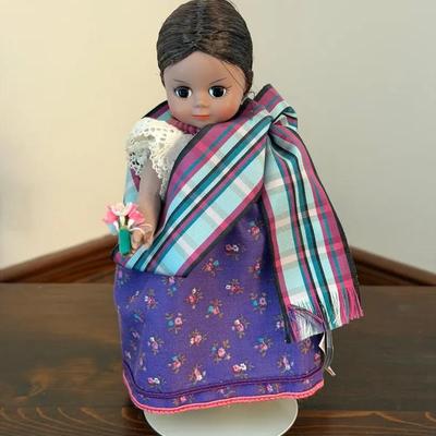 339: Madame Alexander Laos Doll  This collectible Madame Alexander doll represents Laos and is dress