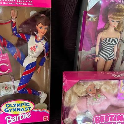 Lot 143:  Olympic Gymnast , Bedtime Barbie, Swimsuit Barbie