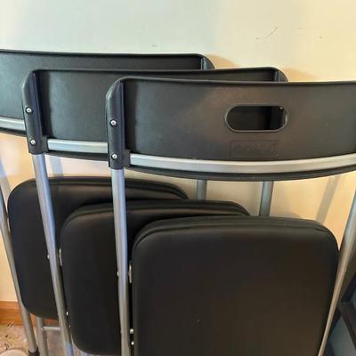 Lot 670:  Set of 3 Cosco Black Folding Chairs with Metal Frames 