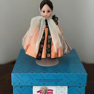 331: Madame Alexander Crete Doll  This collectible Madame Alexander doll represents Crete and is dre