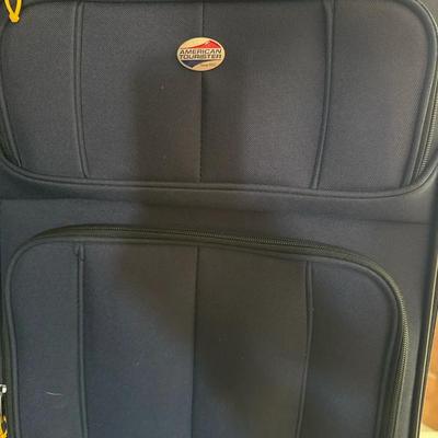 Lot 672:  American Tourister Soft-Sided Rolling Suitcase – Navy Blue
