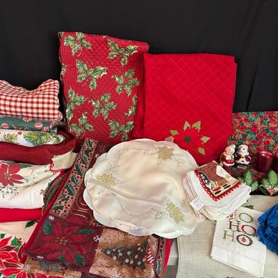 Lot 674: Christmas Linens.. Round Tablecloths, Runners, Placemats, S&P Shakers