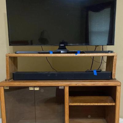 Samsung Smart TV With 2 Remotes, ONN Soundbar With Remote And Entertainment Center