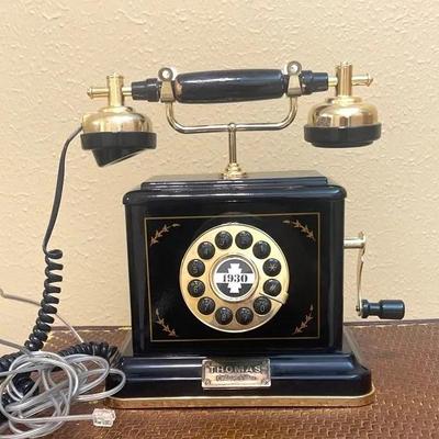 Thomas PP70 Classic 1930s replica telephone with a black body and gold-colored accents.