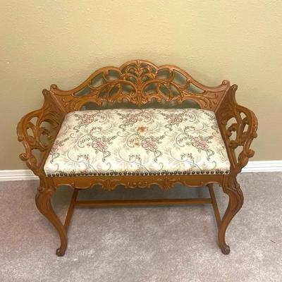 Vintage Italian Rococo ornate Resin vanity bench with a floral upholstered seat. 