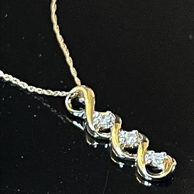 10K Yellow Gold Chain with 10K 3 Diamond Swirl Pendant 