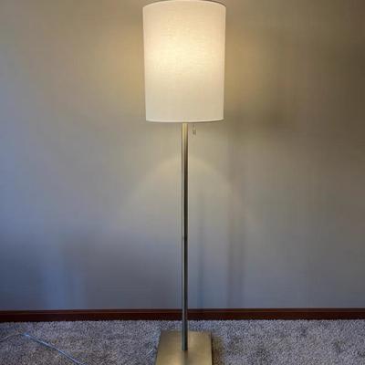 Adesso Liam Floor Lamp ft. Brushed Steel Metal Pole & White Textured Fabric Shade