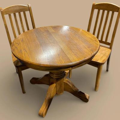 Round Table With Two Matching Chairs