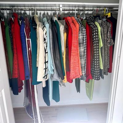 Woman’s Closet Of Dress Suits And Jackets
